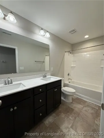 a large kitchen with cabinets