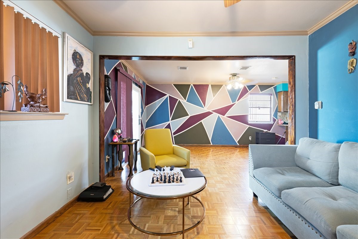 14518 Littleford Street Houston, TX 77045 - Photo 4 of 16 a living room with furniture and a lamp