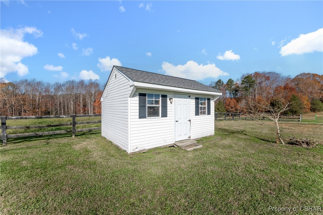 1282 Water View Road Water View, VA 23180 - Photo 23 of 49 View of outdoor structure with a lawn