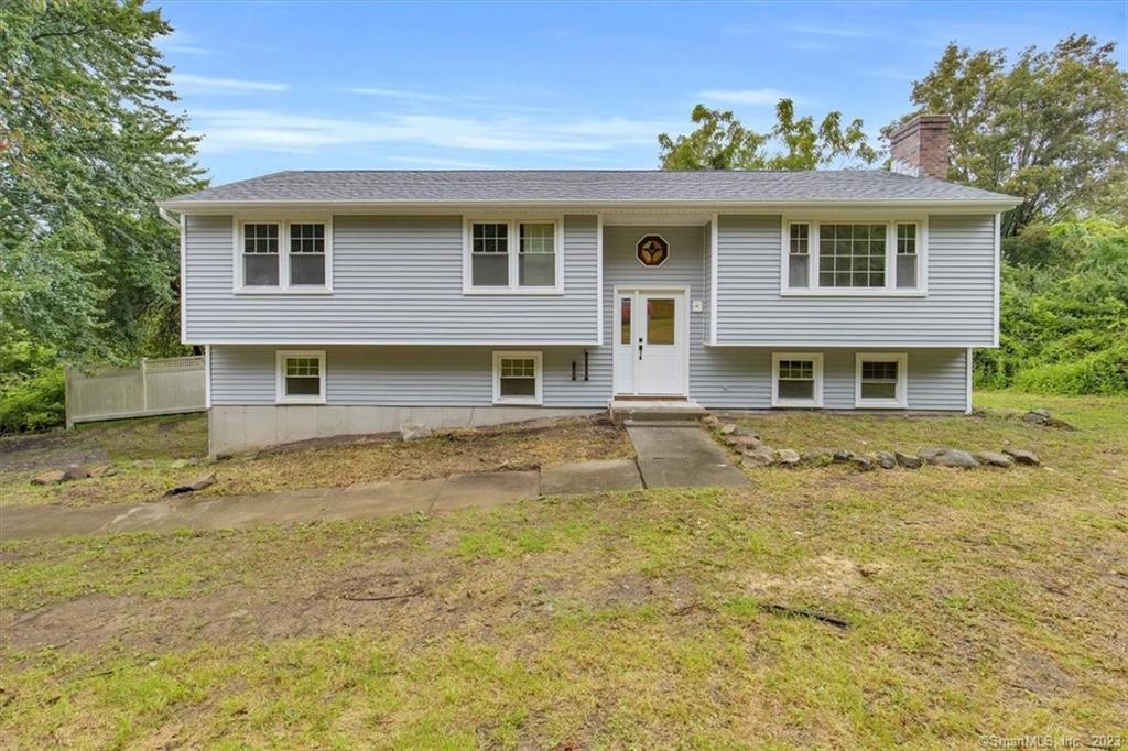 19 Old Army Road Watertown, CT 06795 - Photo 1 of 1 a front view of a house with a garden