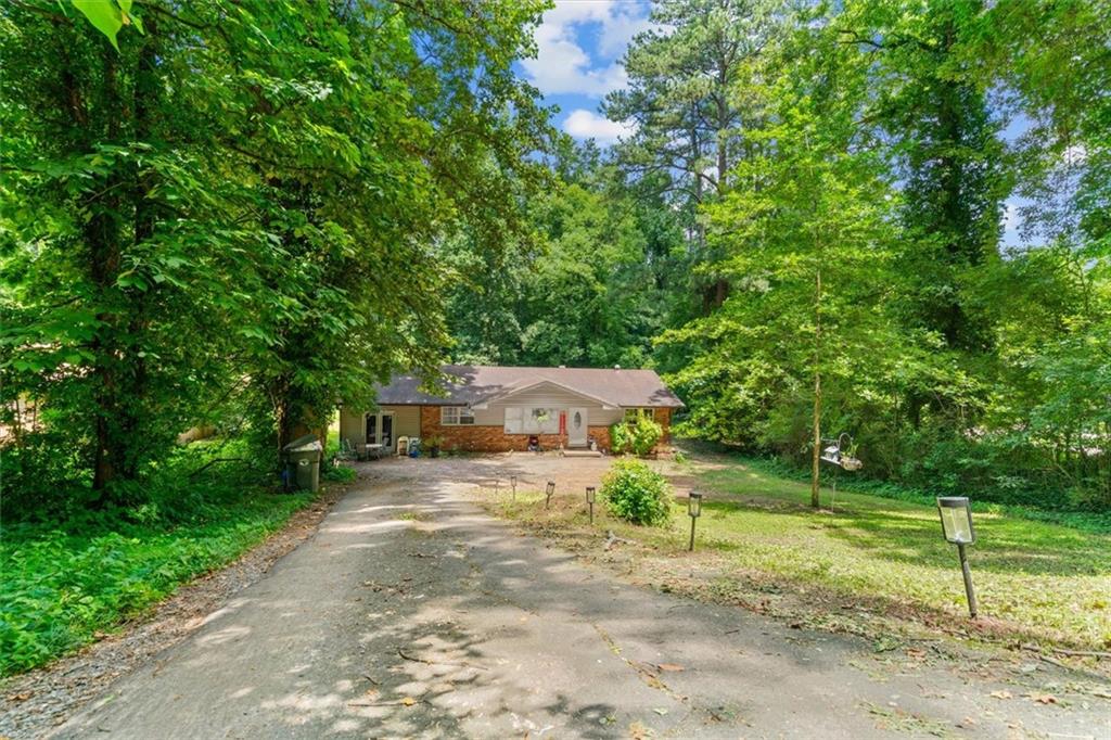1122 Ridgeleigh Circle Dalton, GA 30720 - Photo 2 of 36 a view of a park with large trees
