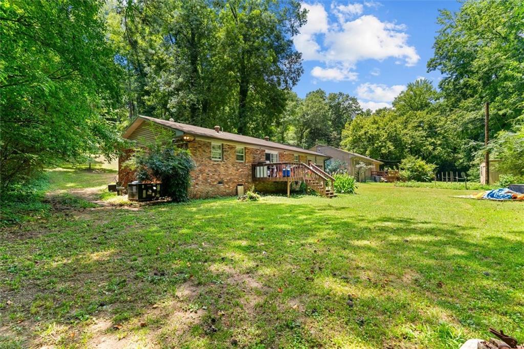 1122 Ridgeleigh Circle Dalton, GA 30720 - Photo 35 of 36 a view of a house with a backyard