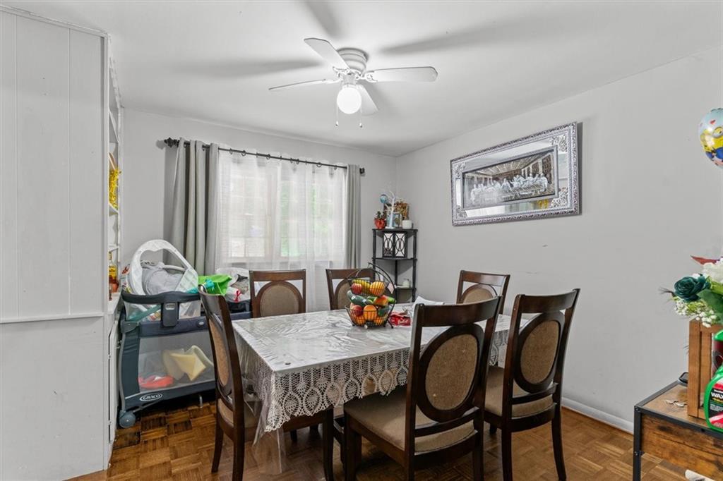 1122 Ridgeleigh Circle Dalton, GA 30720 - Photo 8 of 36 a dining room with furniture and window