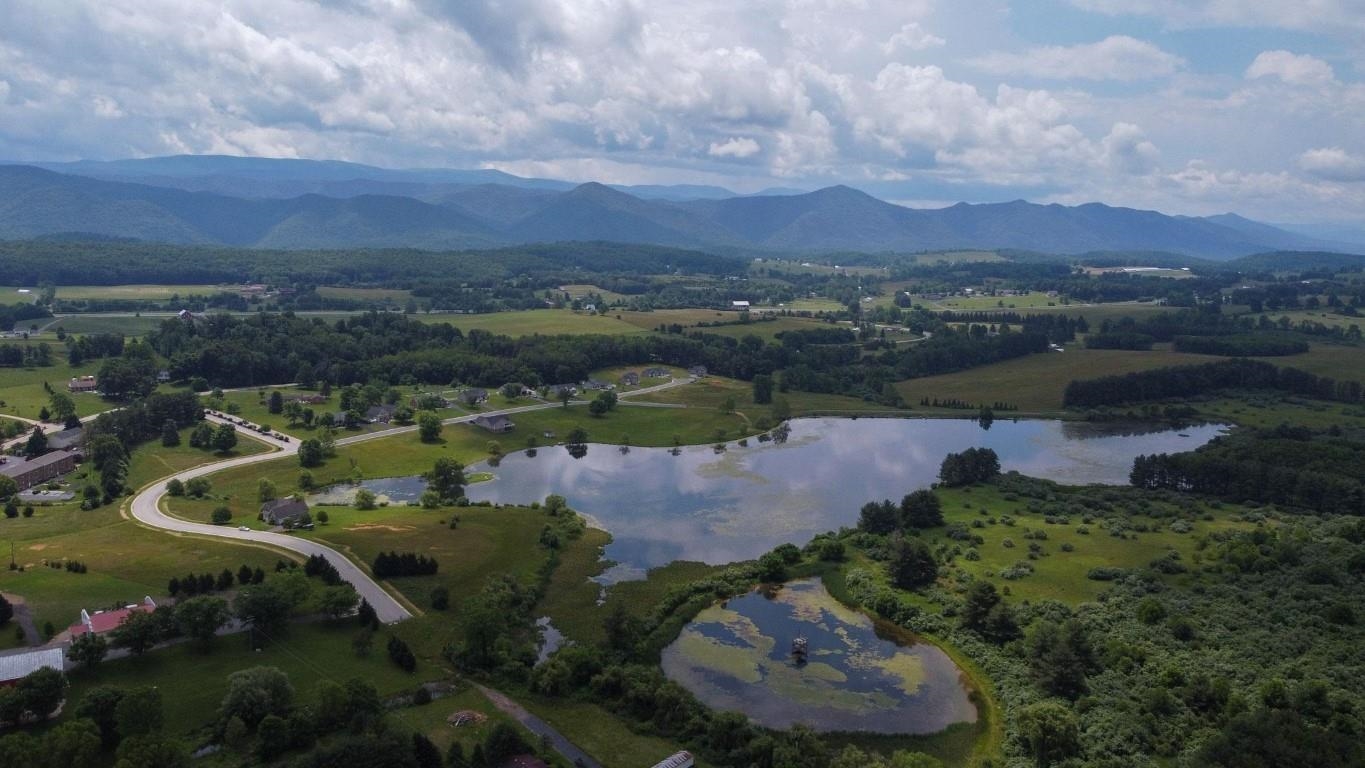 Lot 15 Waterfront Drive Raphine, VA 24472 - Photo 5 of 6 an aerial view of a houses with outdoor space and lake view