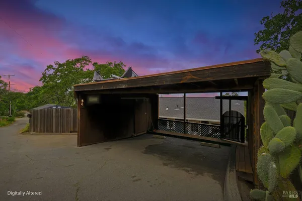 a front view of a house with a garage