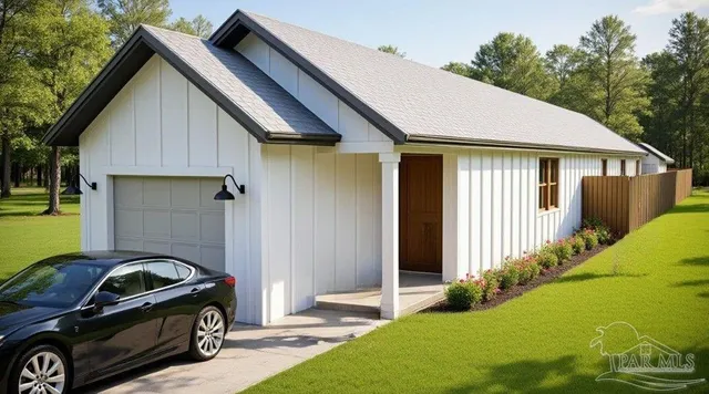 a front view of a house with parking space