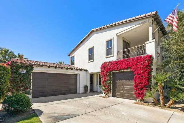 a view of a house with a garage