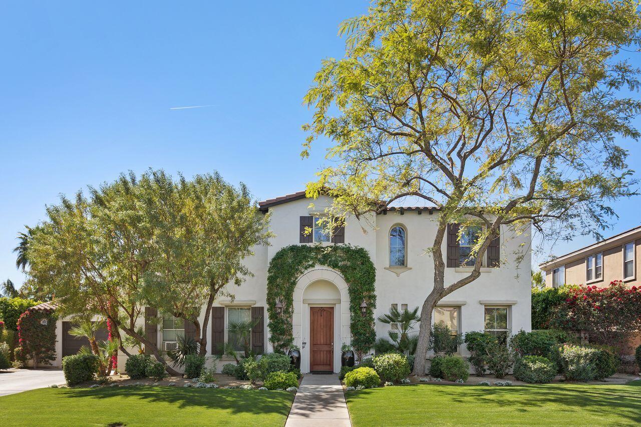 80591 Tangelo Court Indio, CA 92201 - Photo 3 of 30 a front view of a building with garden