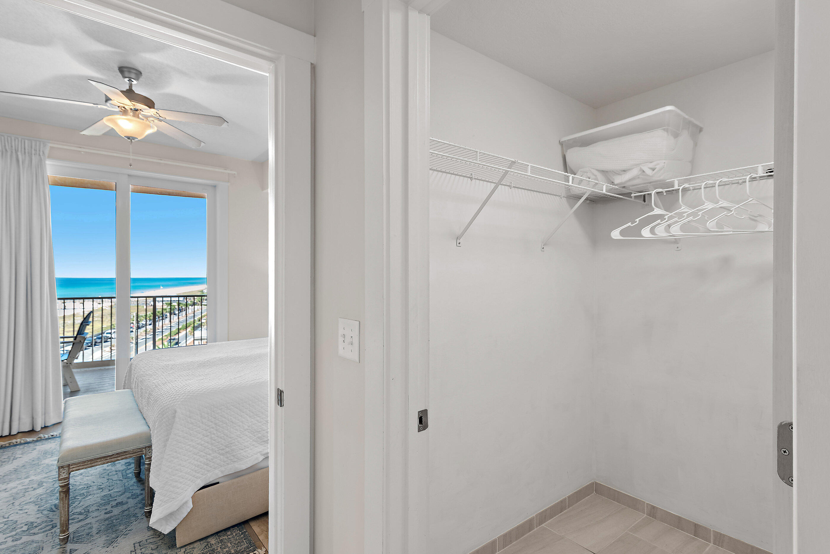 15928 Front Beach Road, Unit 601 Panama City Beach, FL 32413 - Photo 18 of 39 a view of a room with furniture and wooden floor