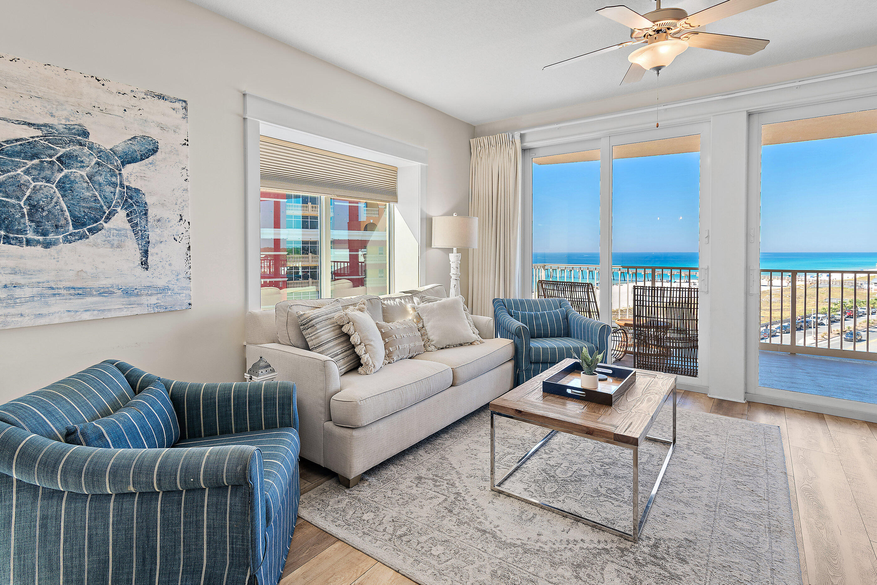 15928 Front Beach Road, Unit 601 Panama City Beach, FL 32413 - Photo 2 of 39 a living room with furniture and a window