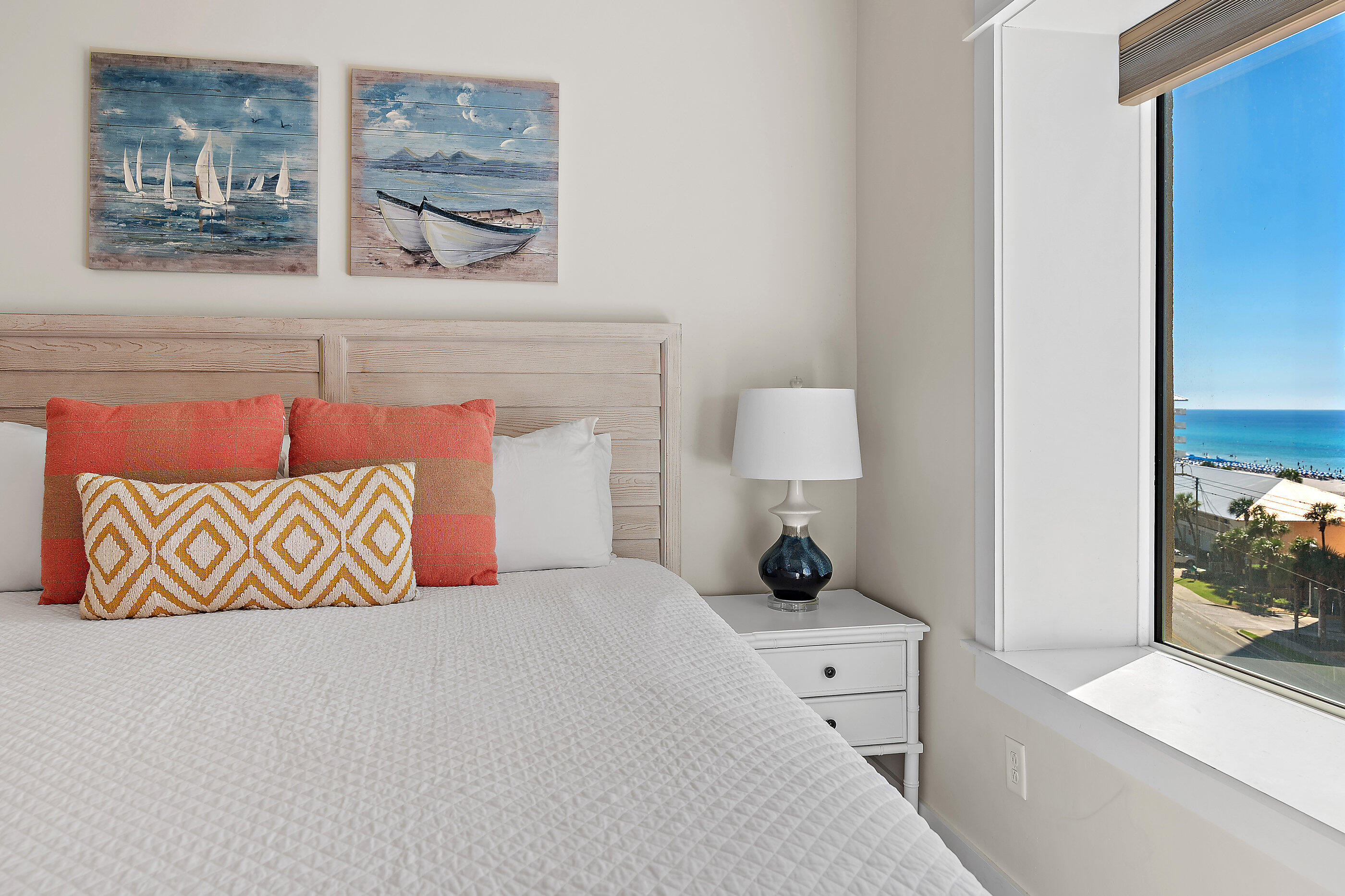 15928 Front Beach Road, Unit 601 Panama City Beach, FL 32413 - Photo 25 of 39 a bedroom with a bed and a painting on the wall