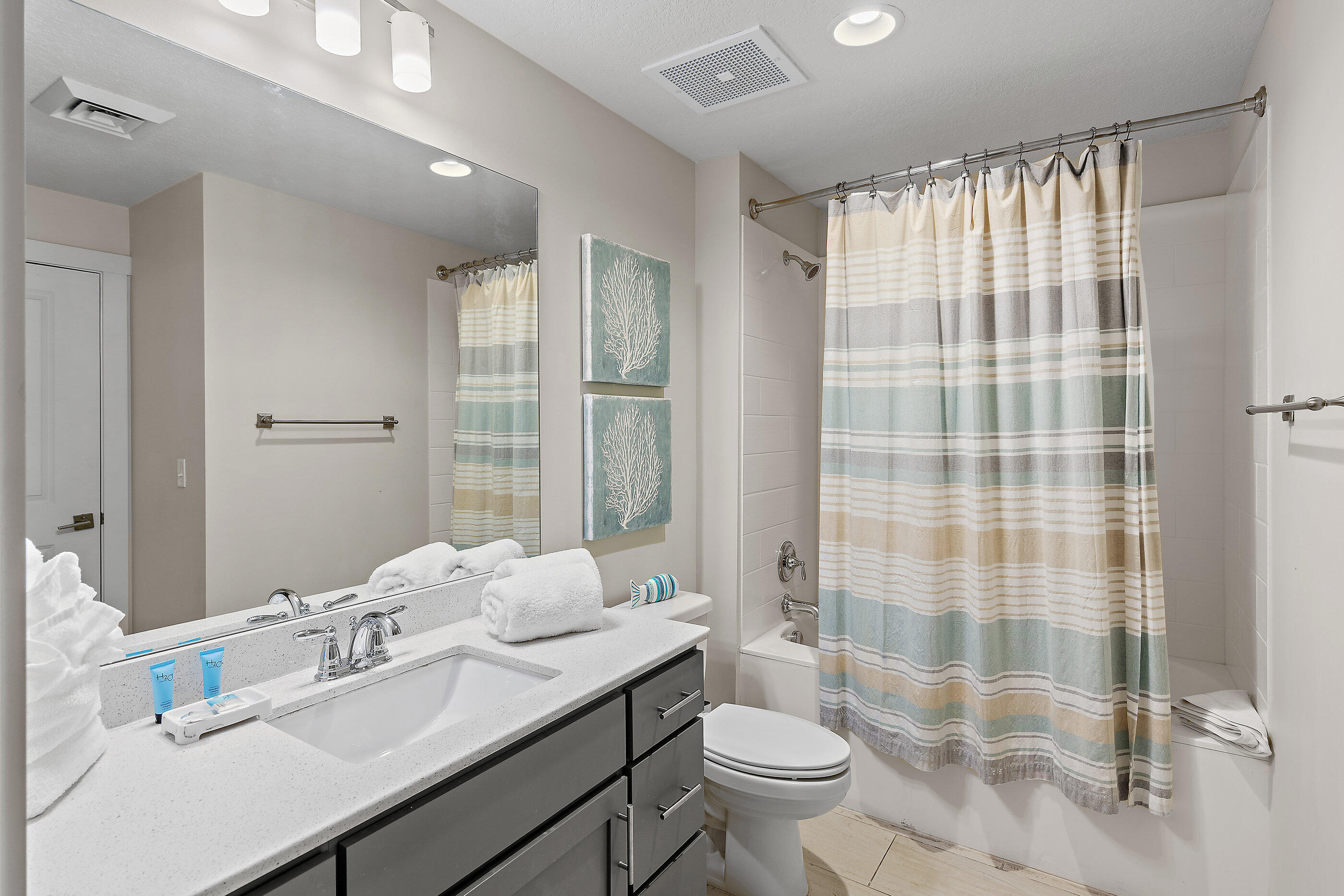 15928 Front Beach Road, Unit 601 Panama City Beach, FL 32413 - Photo 32 of 39 a bathroom with a sink toilet and shower