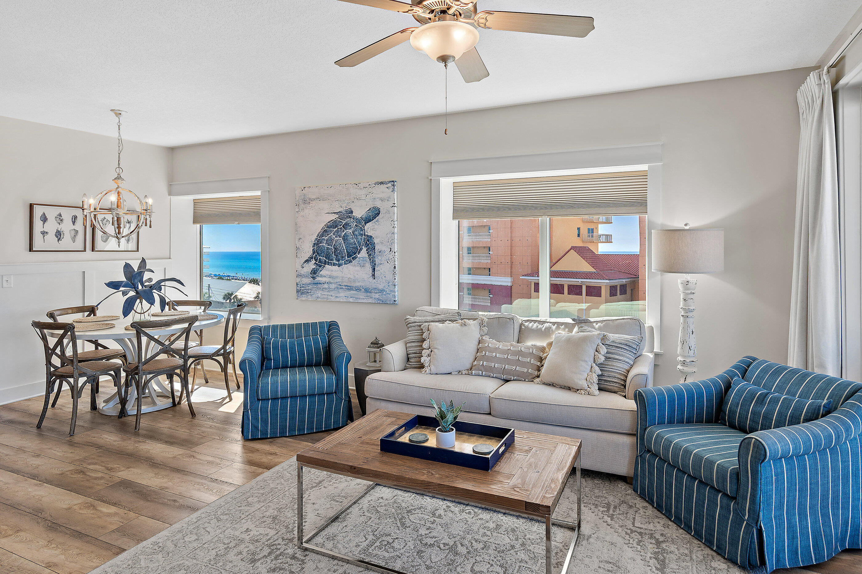 15928 Front Beach Road, Unit 601 Panama City Beach, FL 32413 - Photo 4 of 39 a living room with furniture and a large window