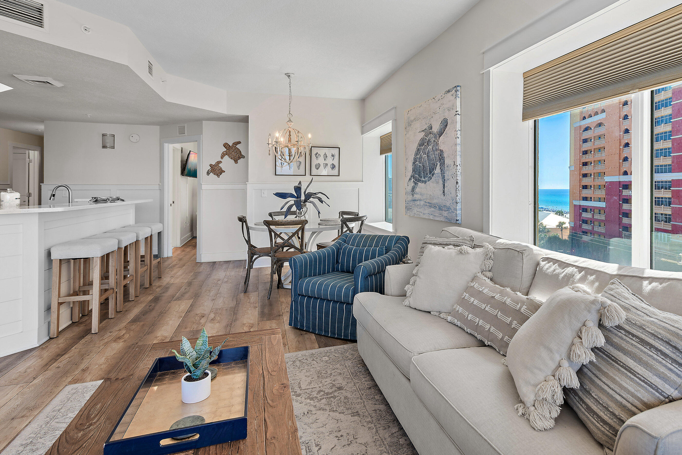 15928 Front Beach Road, Unit 601 Panama City Beach, FL 32413 - Photo 5 of 39 a living room with furniture and a large window