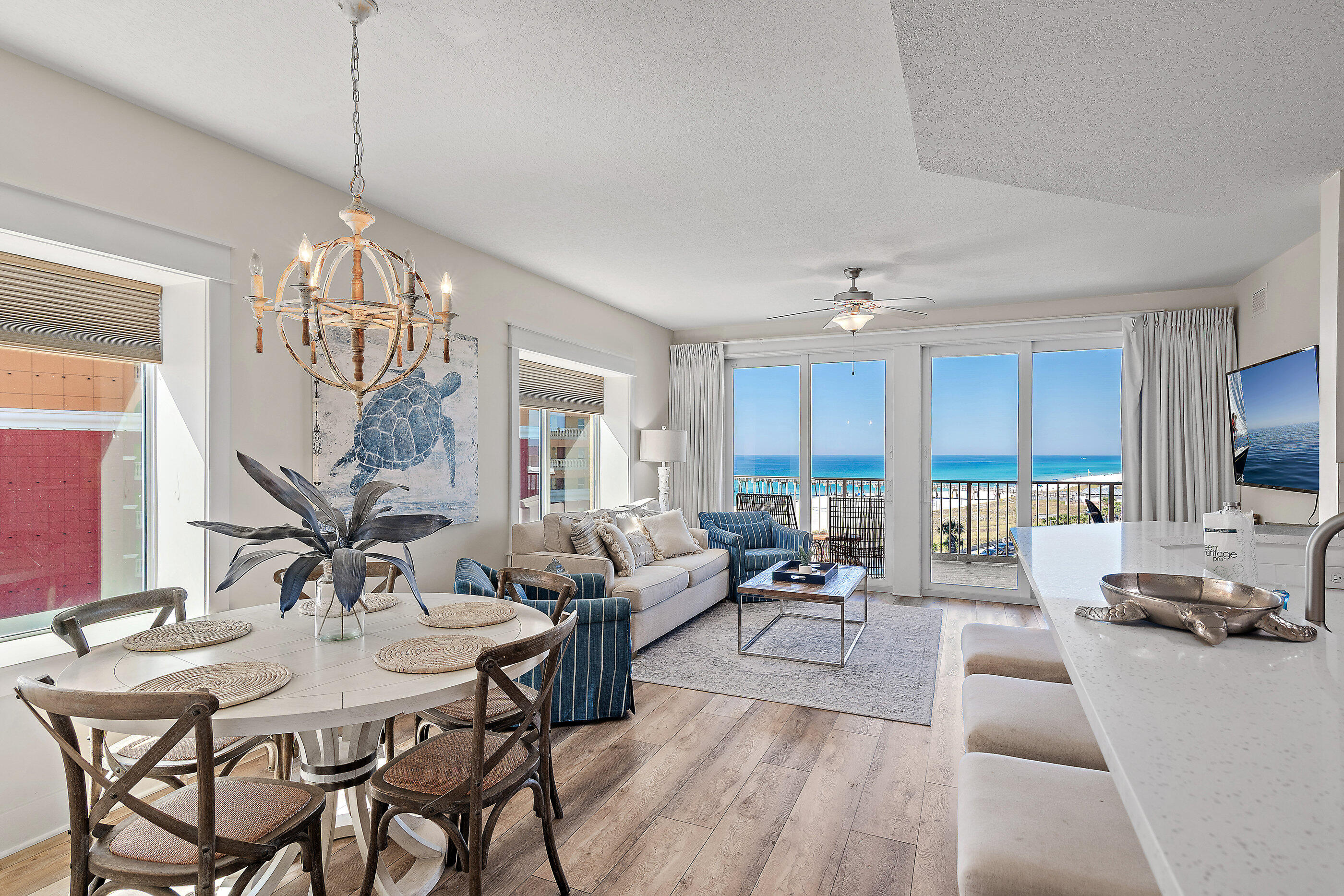 15928 Front Beach Road, Unit 601 Panama City Beach, FL 32413 - Photo 9 of 39 a view of a dining room with furniture window and outside view