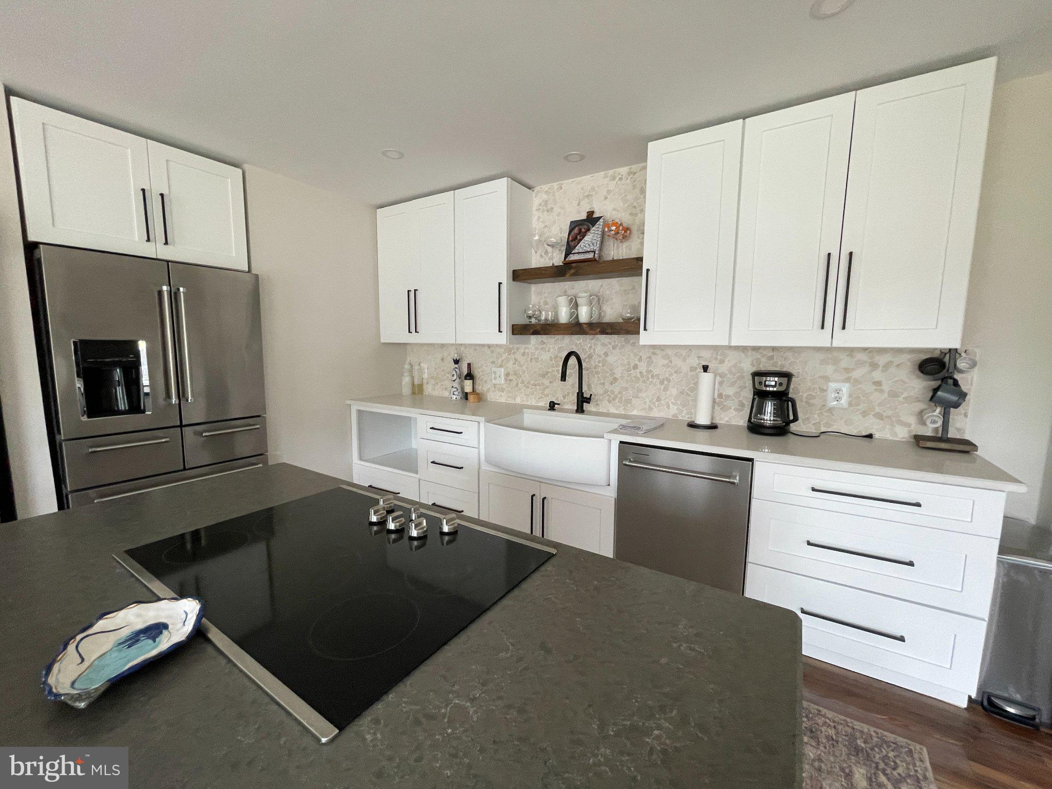 8841 Broomes Island Road Broomes Island, MD 20615 - Photo 14 of 20 Sleek modern kitchen with elegant finishes.