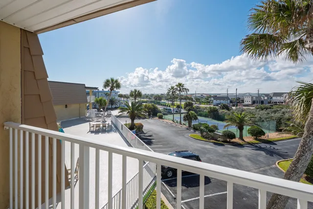 a view of a balcony with an outdoor space