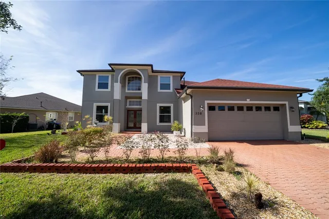 a front view of house with yard