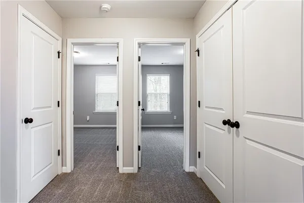 a view of a bathroom with a glass shower door