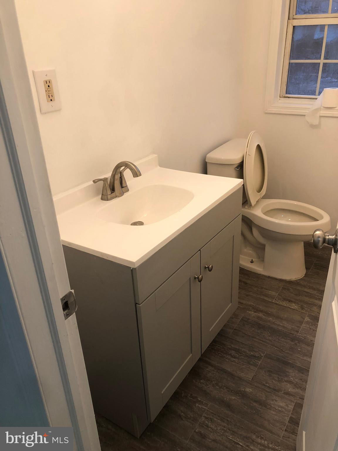 193 Kinsley Road Pemberton, NJ 08068 - Photo 5 of 22 a bathroom with a sink and a toilet