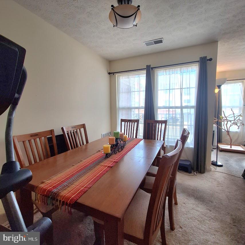 9609 Haven Farm Road, Unit 9609H Perry Hall, MD 21128 - Photo 9 of 21 Inviting dining space with natural light.