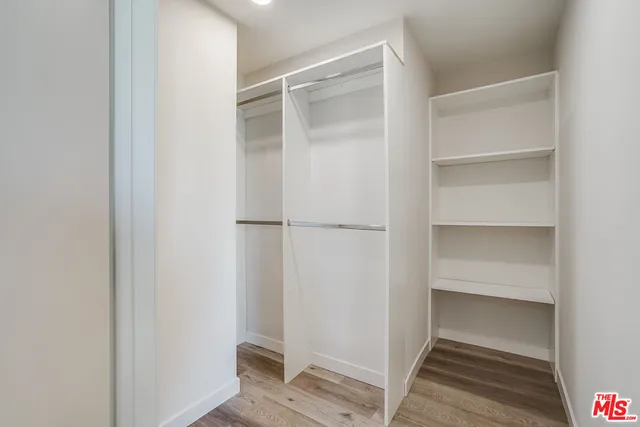 a view of an empty walk in closet