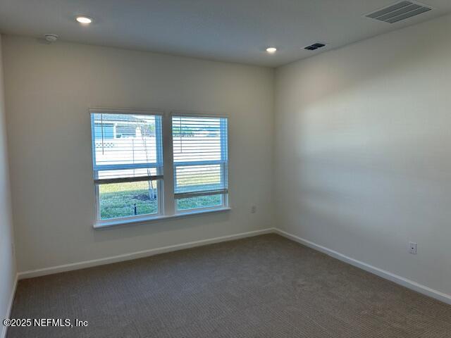 156 Camphor Laurel Road St. Augustine, FL 32092 - Photo 9 of 34 an empty room with a window