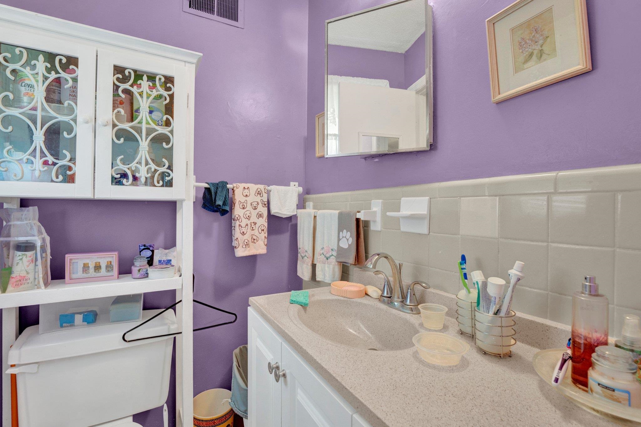 3273 Graves Road Memphis, TN 38116 - Photo 11 of 16 a bathroom with a sink vanity and toilet