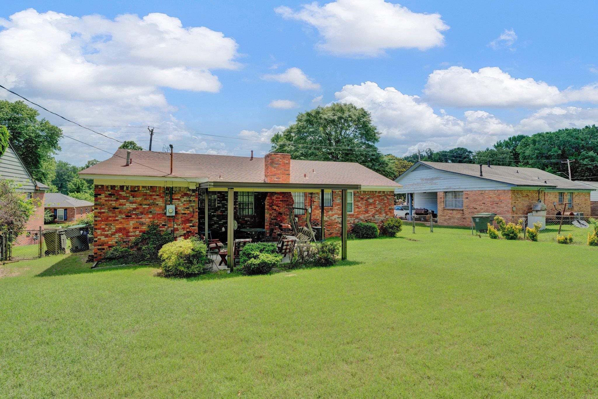 3273 Graves Road Memphis, TN 38116 - Photo 13 of 16 a front view of house with yard and green space