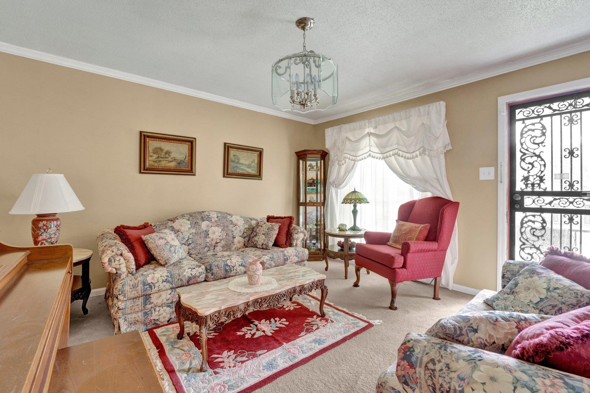 3273 Graves Road Memphis, TN 38116 - Photo 2 of 16 a living room with furniture a rug and a window