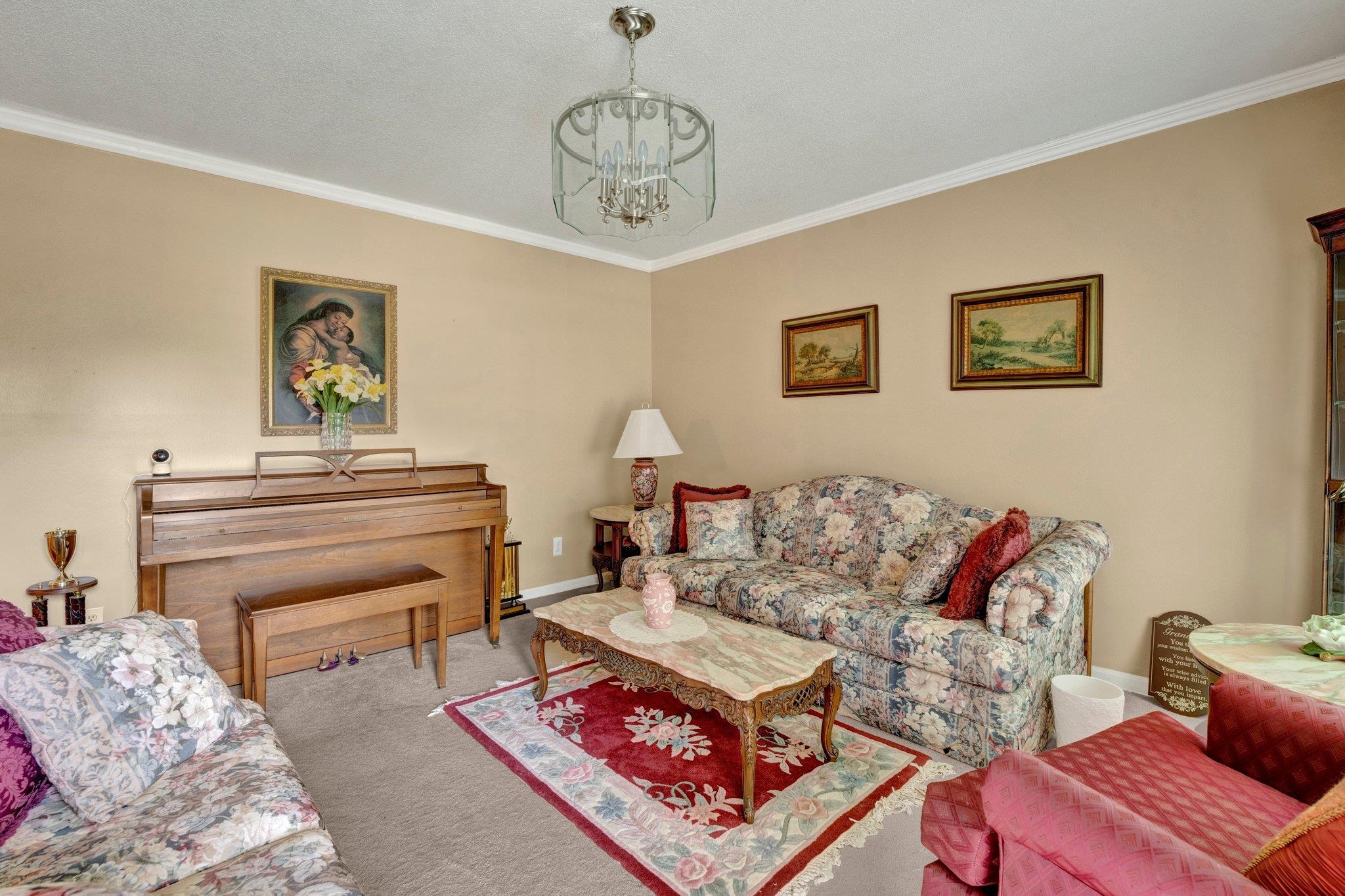 3273 Graves Road Memphis, TN 38116 - Photo 3 of 16 a living room with furniture and a piano