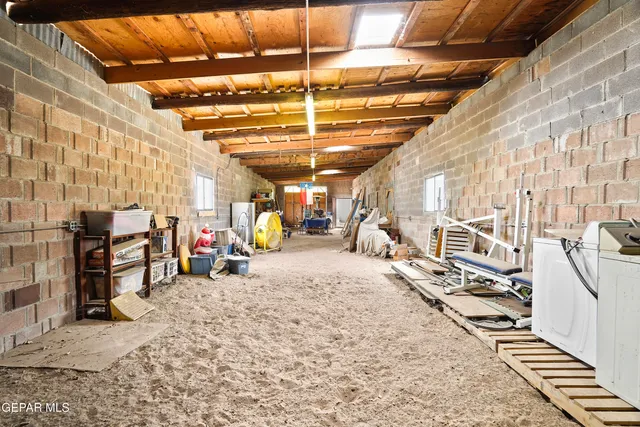 a front view of house with yard and car parked
