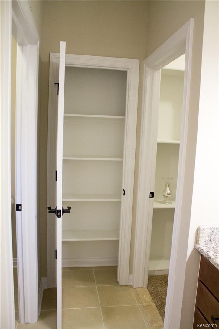 1901 Fiddler Court, Unit 7 Howell, MI 48843 - Photo 14 of 77 Extra closet in Front Main Bath