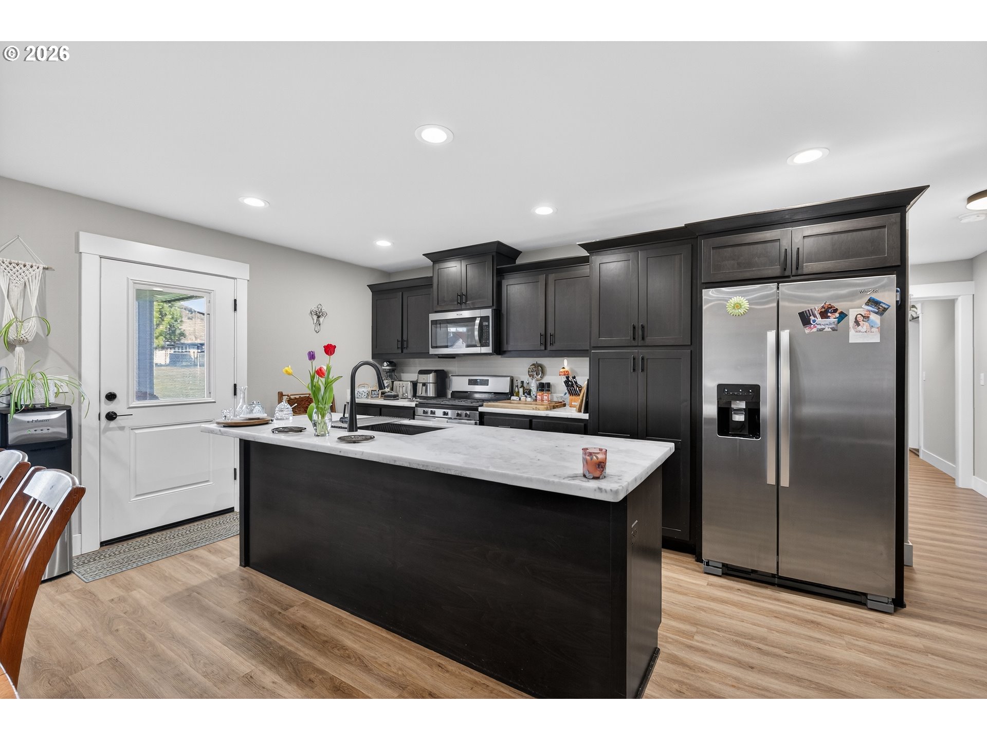 669 Northwest T Street Winston, OR 97496 - Photo 11 of 36 a kitchen with stainless steel appliances granite countertop a sink stove and refrigerator