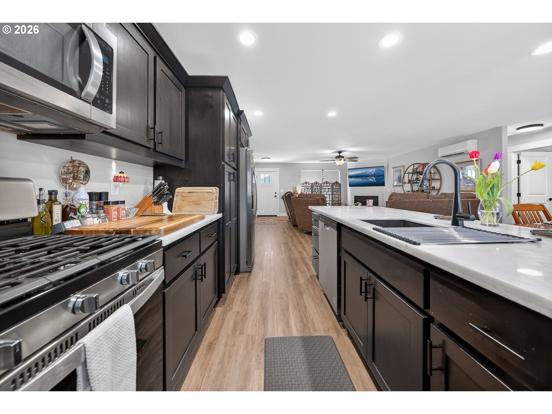 669 Northwest T Street Winston, OR 97496 - Photo 13 of 36 a kitchen with stainless steel appliances granite countertop a sink stove and cabinets