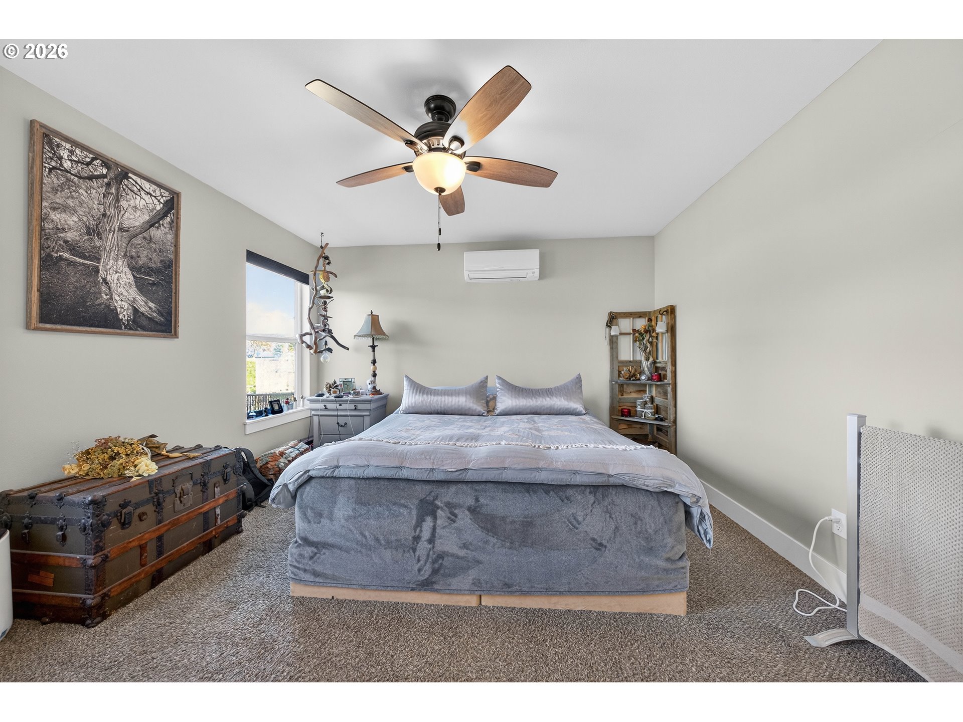 669 Northwest T Street Winston, OR 97496 - Photo 15 of 36 a bedroom with a bed and dresser