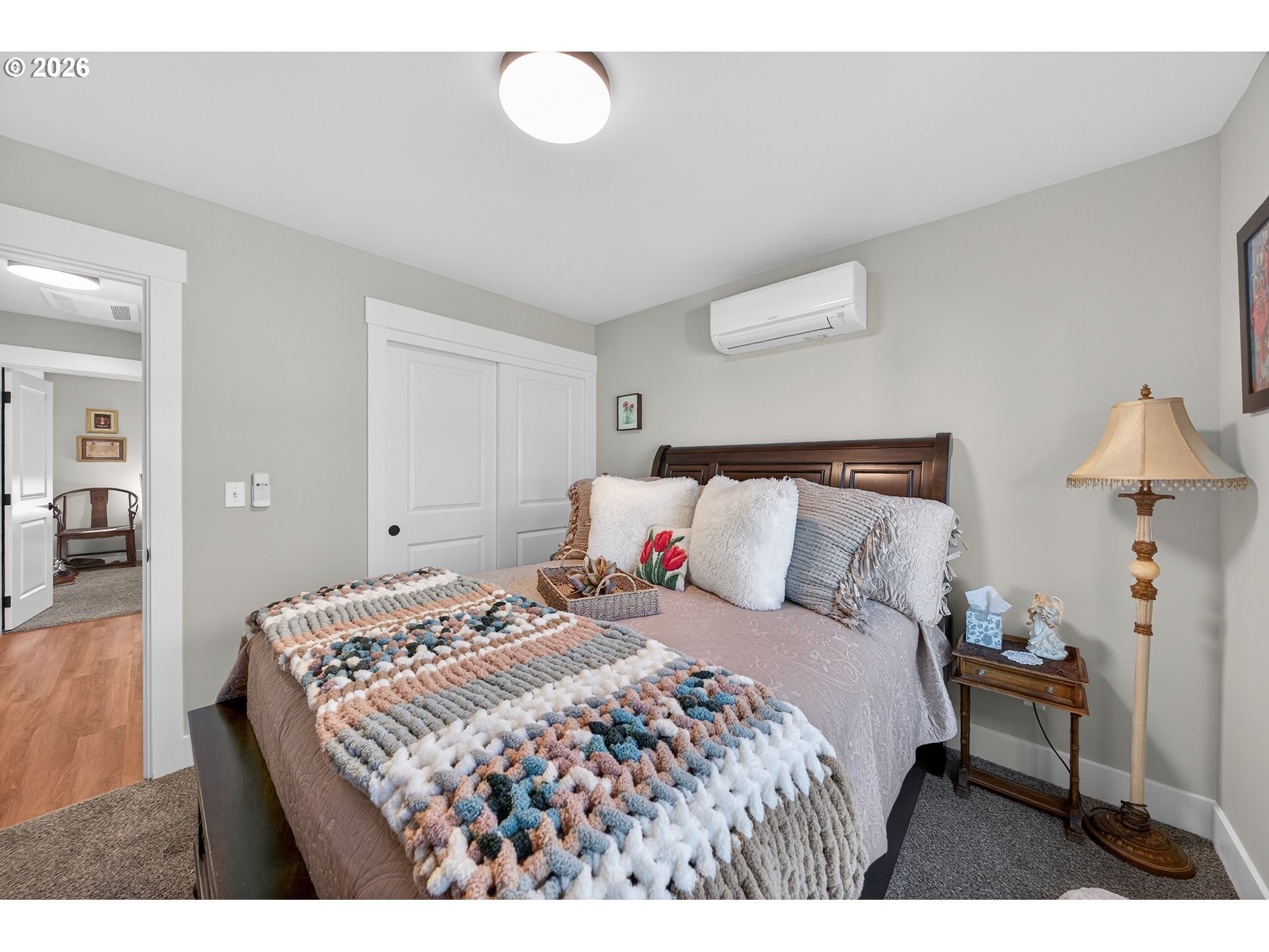 669 Northwest T Street Winston, OR 97496 - Photo 22 of 36 a bedroom with a bed and a lamp