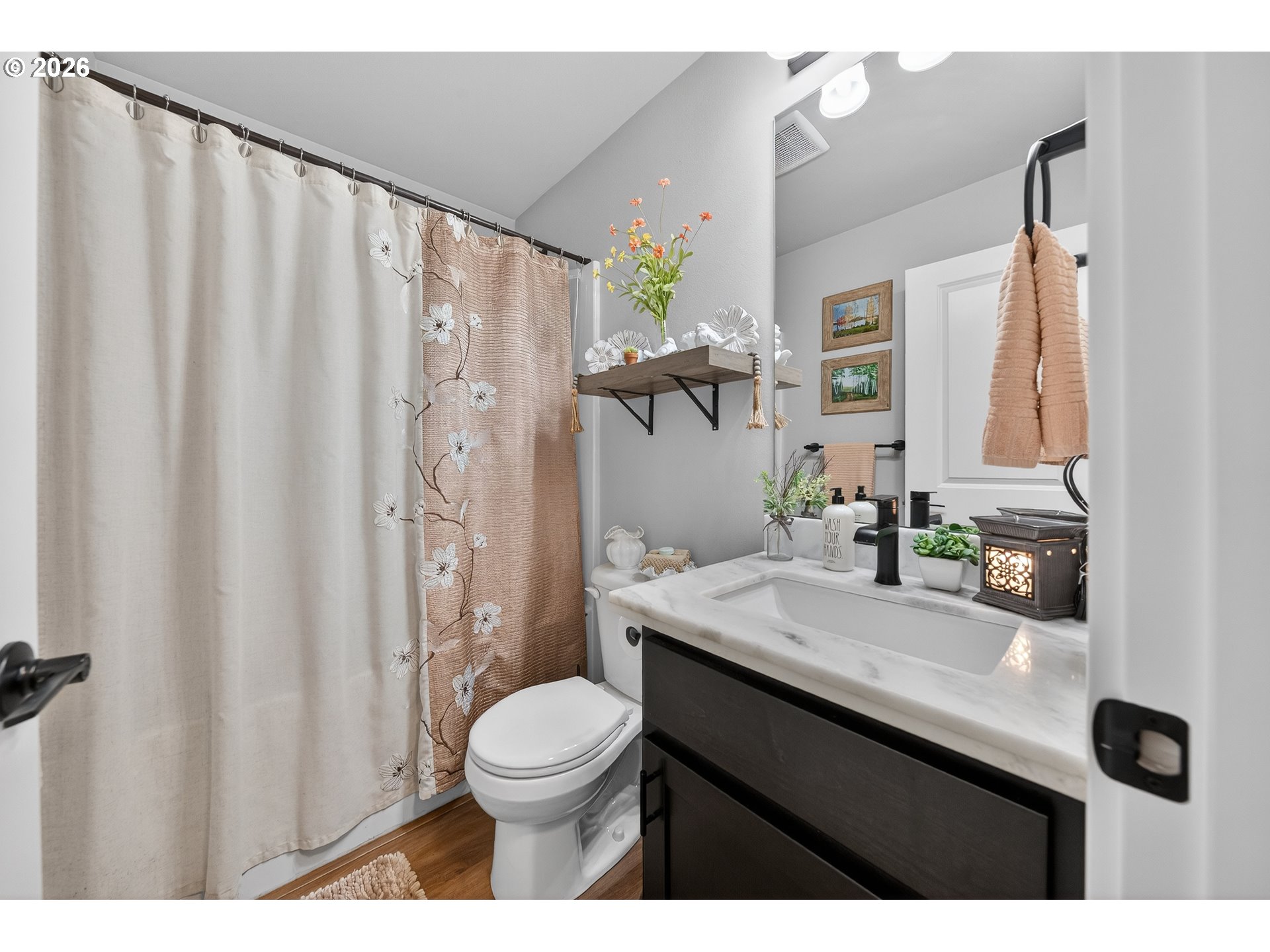 669 Northwest T Street Winston, OR 97496 - Photo 24 of 36 a bathroom with a granite countertop sink toilet and shower