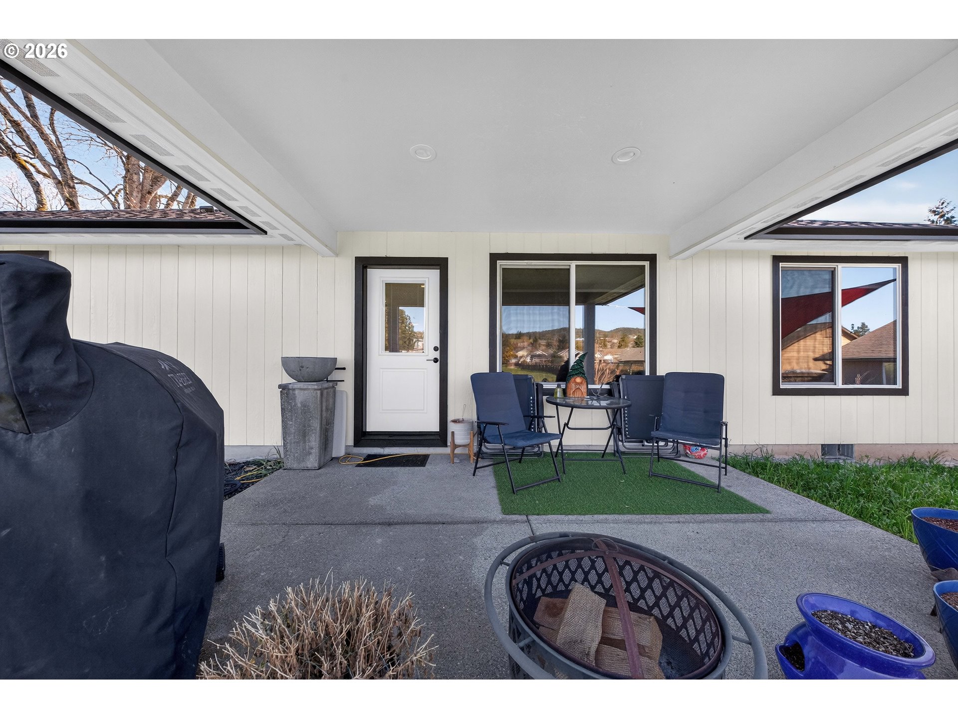 669 Northwest T Street Winston, OR 97496 - Photo 30 of 36 a bed room with a bed and a chair