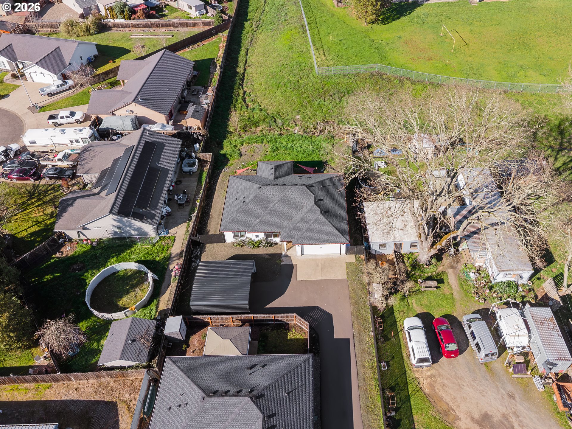 669 Northwest T Street Winston, OR 97496 - Photo 34 of 36 an aerial view of houses with yard