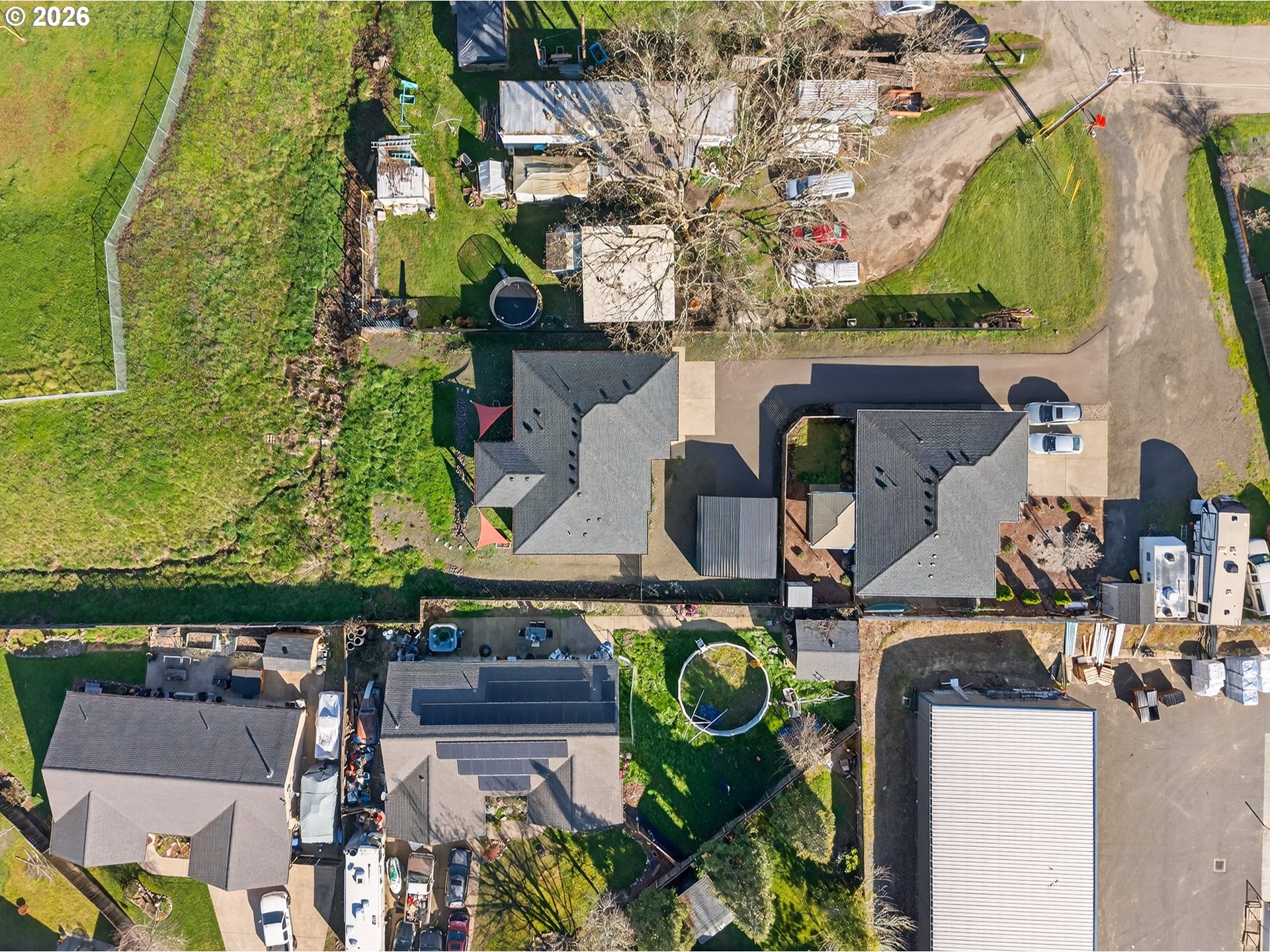 669 Northwest T Street Winston, OR 97496 - Photo 35 of 36 an aerial view of a house with yard swimming pool and outdoor seating