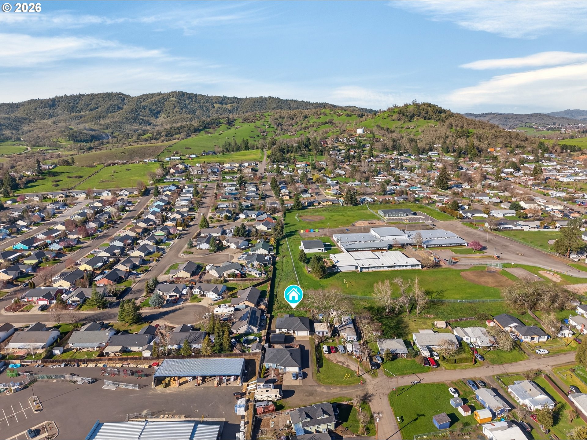 669 Northwest T Street Winston, OR 97496 - Photo 36 of 36 an aerial view of residential houses with outdoor space