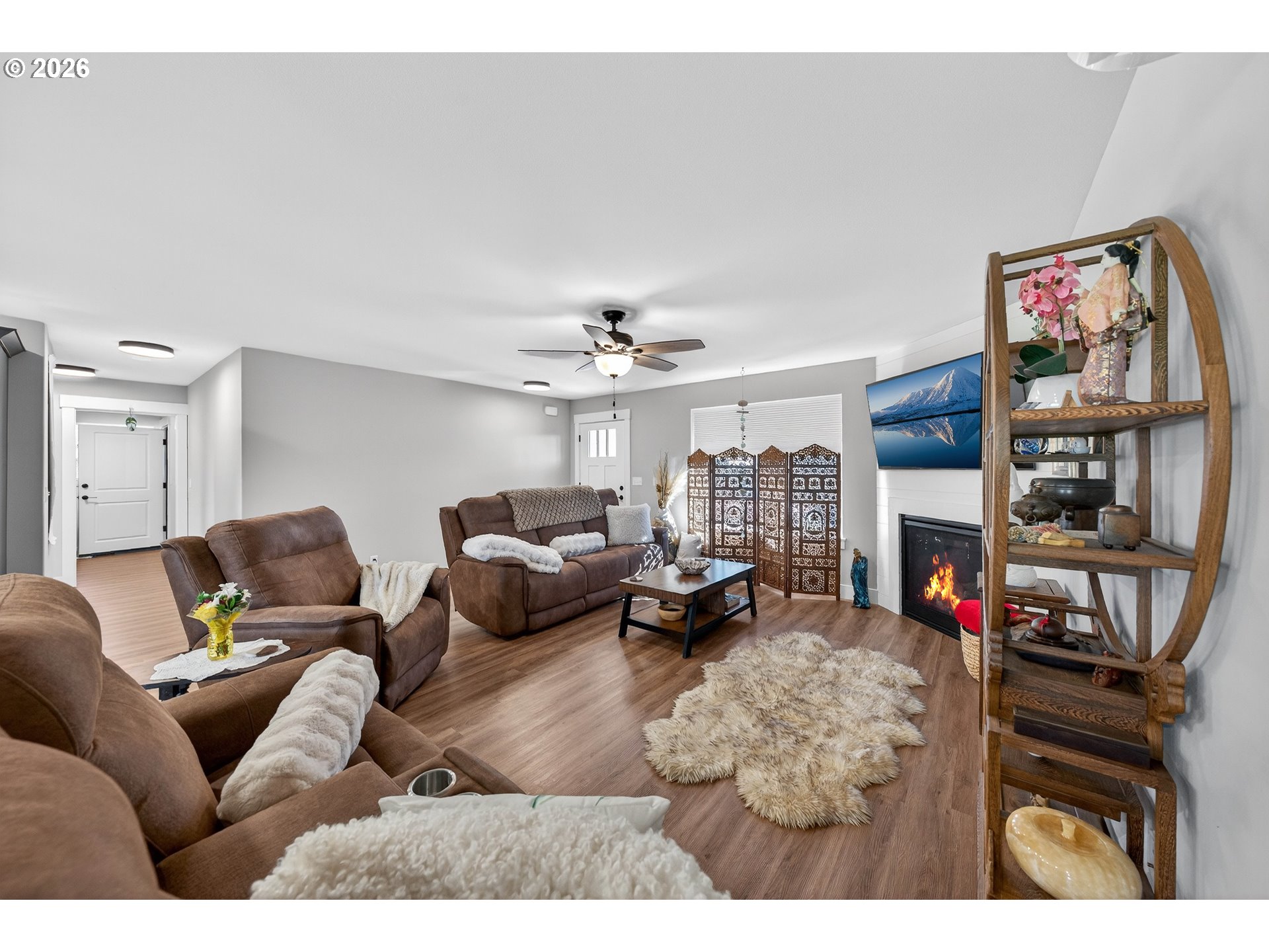 669 Northwest T Street Winston, OR 97496 - Photo 7 of 36 a living room with furniture fireplace and flat screen tv
