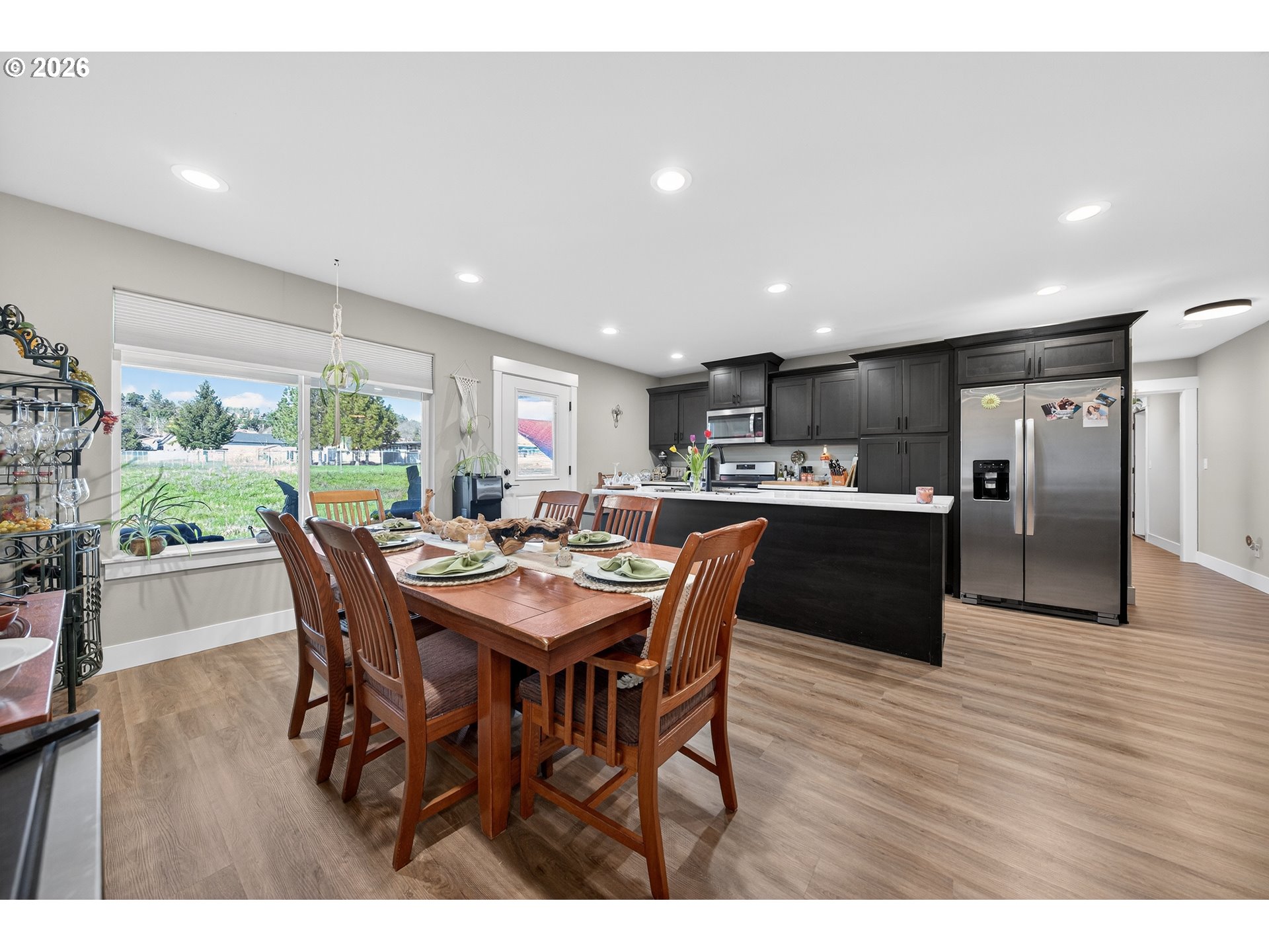 669 Northwest T Street Winston, OR 97496 - Photo 10 of 36 a kitchen with a table and chairs in it