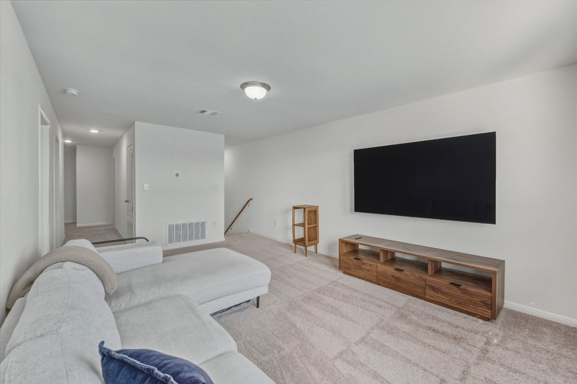 201 Wonderful Life Way Jarrell, TX 76537 - Photo 17 of 39 Second Living area on upper level floor.