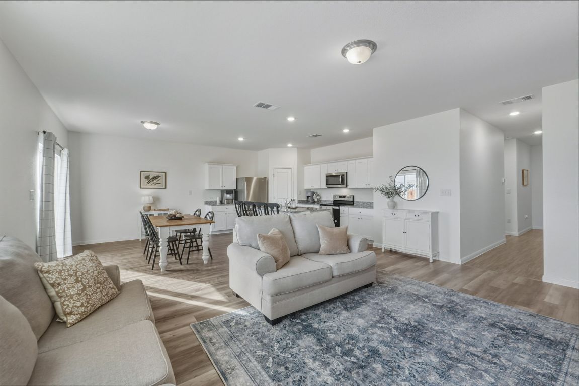 201 Wonderful Life Way Jarrell, TX 76537 - Photo 38 of 39 Open floor plan with functional space. Recessed lighting.