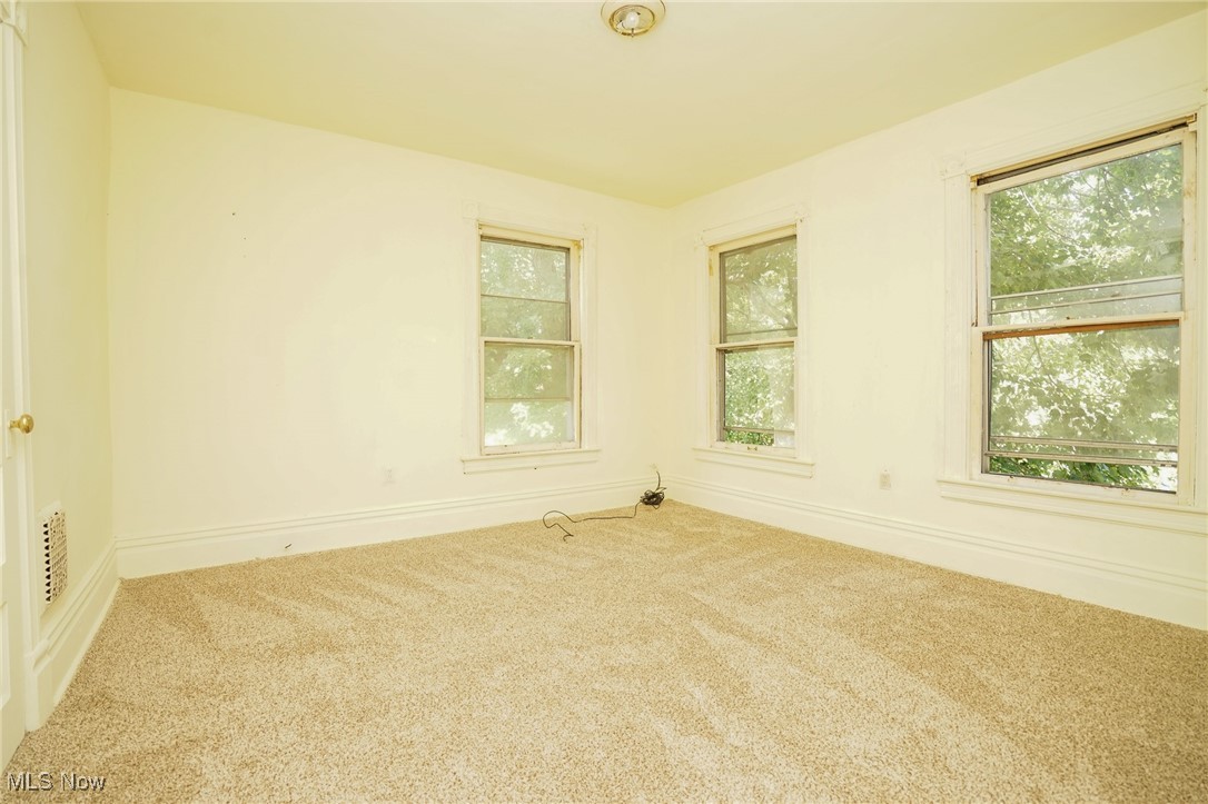 1720 Jacobs Road Youngstown, OH 44505 - Photo 8 of 18 Carpeted spare room with plenty of natural light