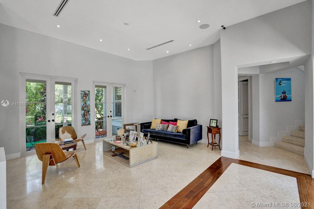 12260 Southwest 95th Avenue Miami, FL 33176 - Photo 21 of 98 a living room with furniture and a large window