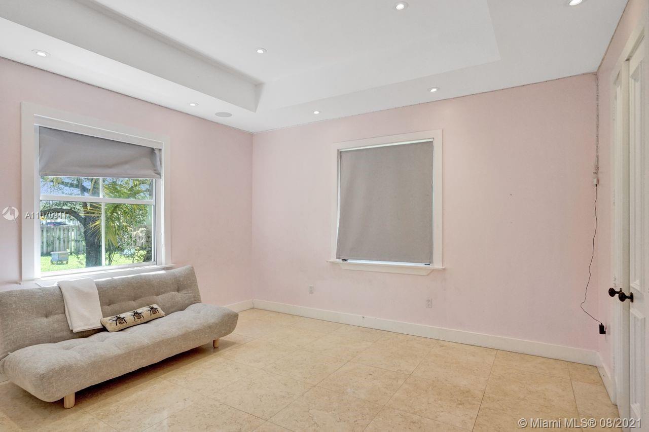 12260 Southwest 95th Avenue Miami, FL 33176 - Photo 45 of 98 a living room with furniture and a window