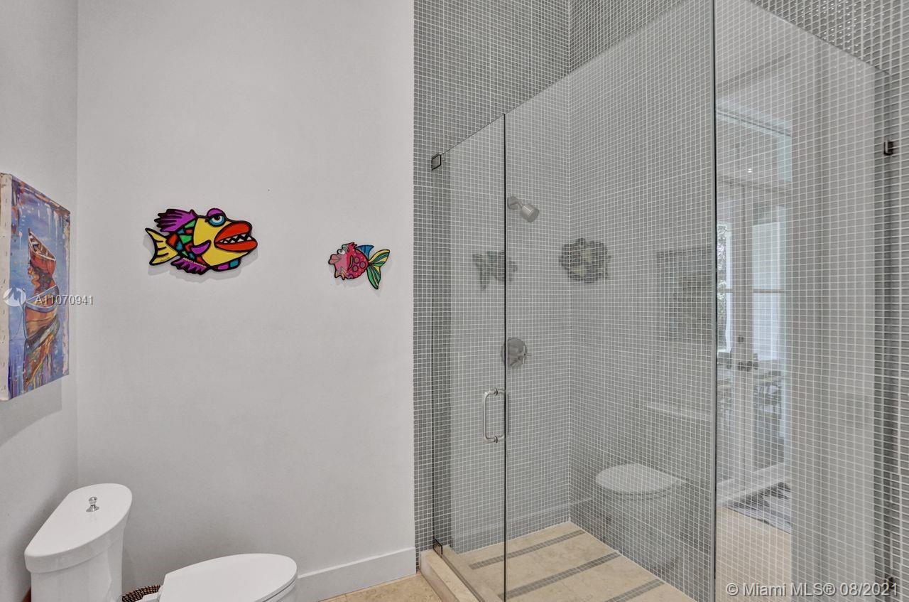 12260 Southwest 95th Avenue Miami, FL 33176 - Photo 62 of 98 a bathroom with a toilet and a shower